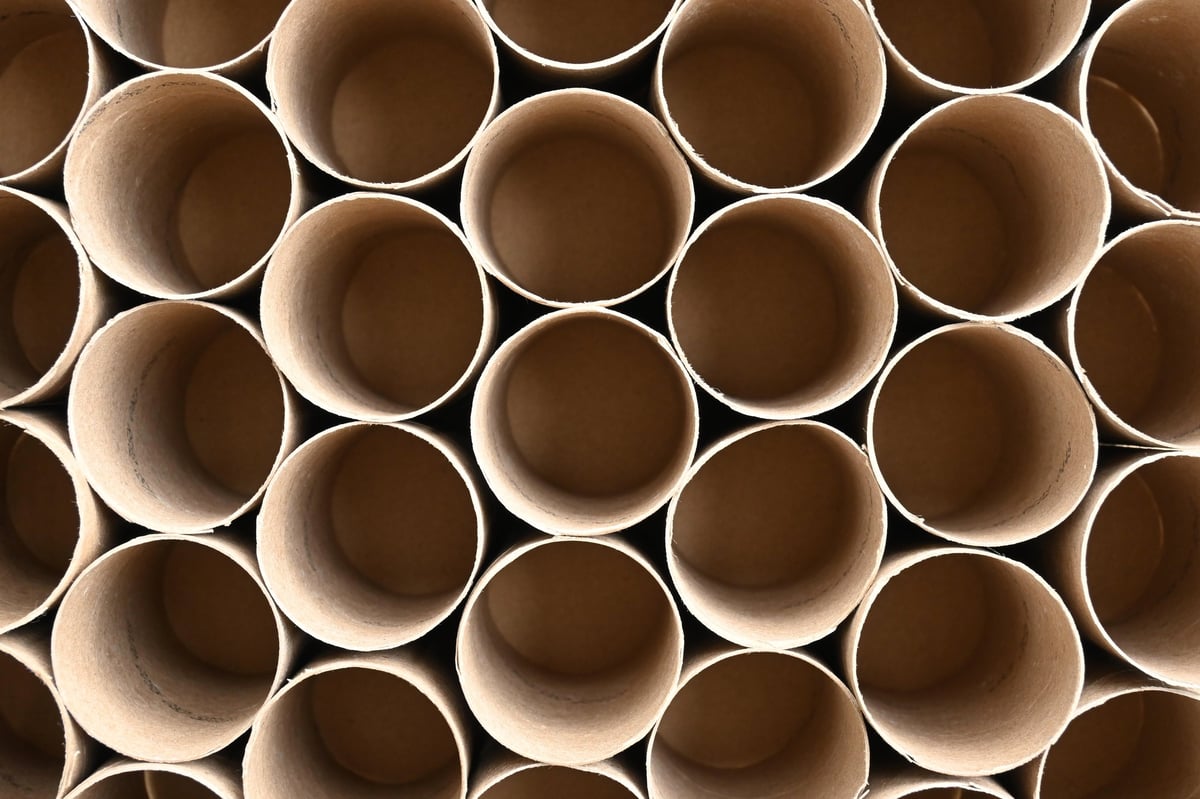 Industrial paper cores arranged in a repeating pattern