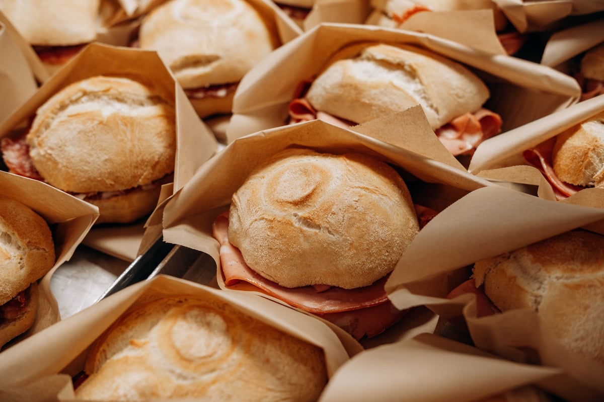 Fresh bread wrapped in brown paper