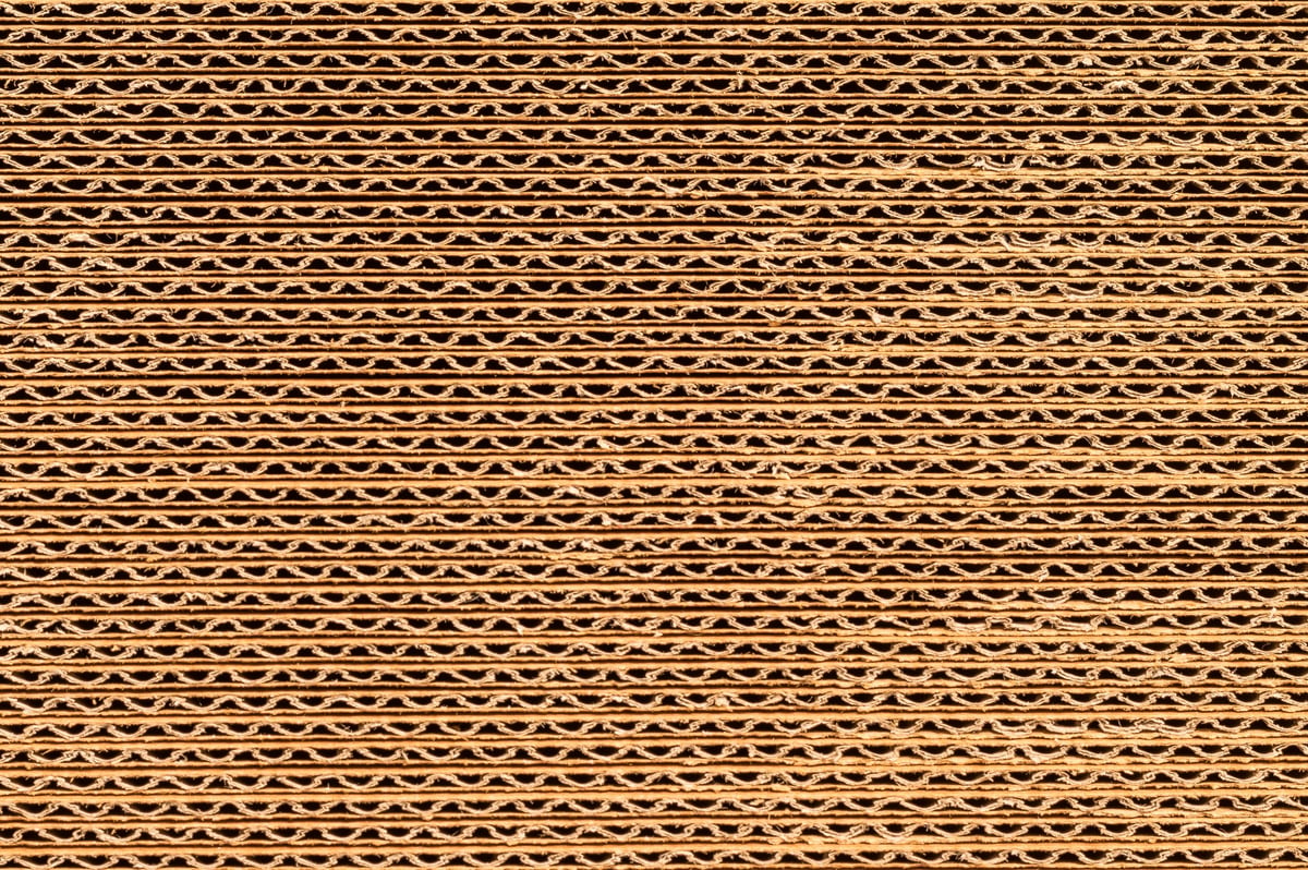 Cardboard textured edges stack up showing corrugated layers